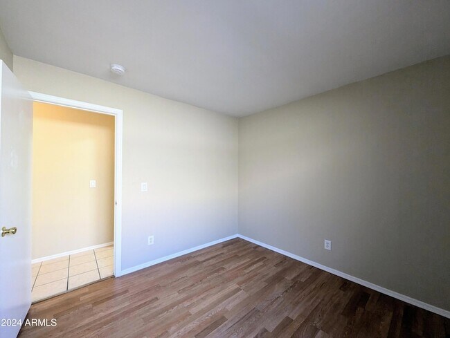 Building Photo - 7059 W Gardenia Ave