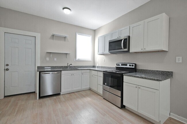 Building Photo - Updated 4-bedroom, 2-bathroom house!