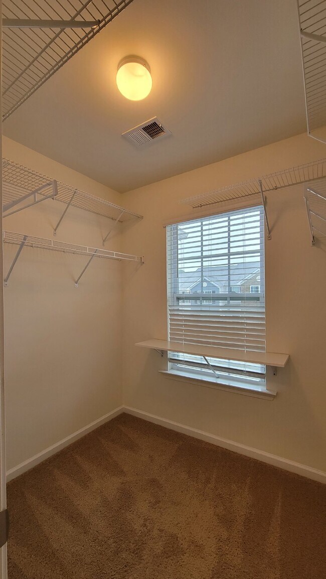 Building Photo - "Modern 3-Bedroom Multiplex with 3 Full Ba...