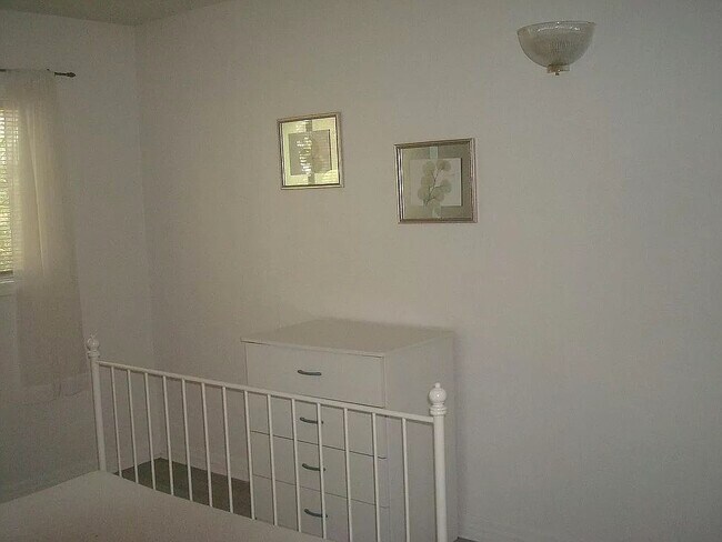 Larger Bedroom - 415 N Halifax Ave