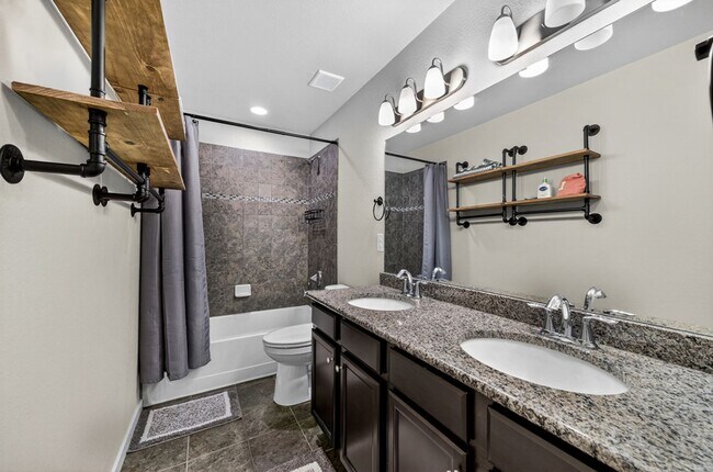Building Photo - Upgraded 4-Bedroom Corner Lot Home with Mountain Views
