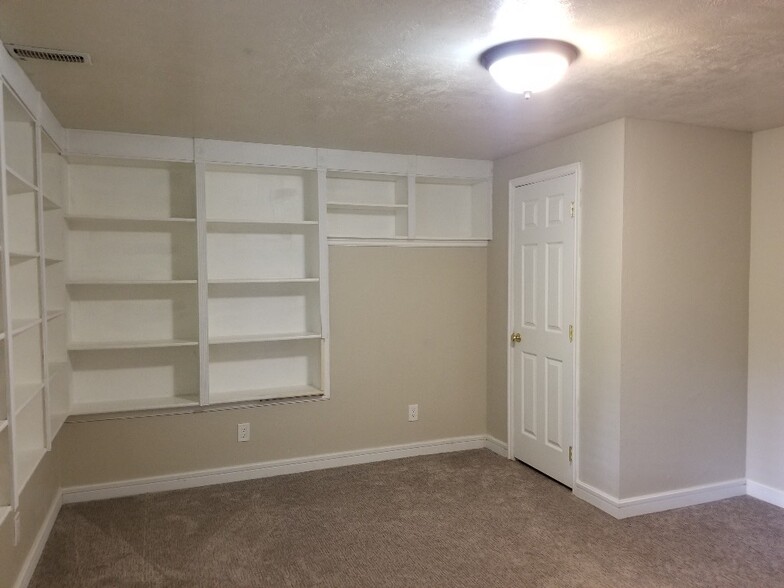 Bedroom 2 with built in shelves - 12084 S Allison Park Ct
