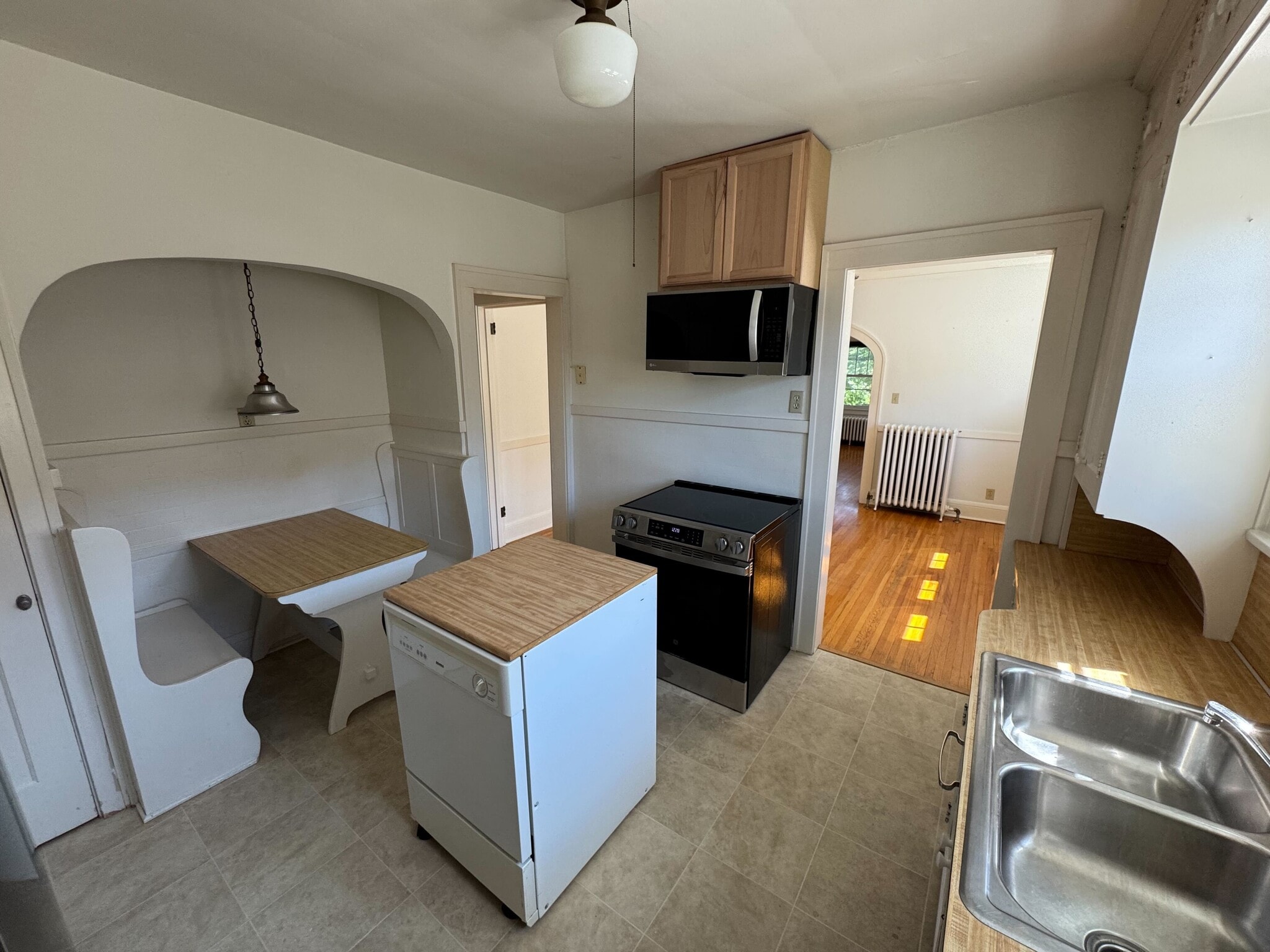 Kitchen, with new stainless steel oven and microwave - 4942 Lyndale Ave S