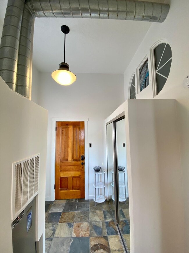 Building Photo - Modern 2BD Loft with Vintage Charm – Prime Historic Downtown Location!