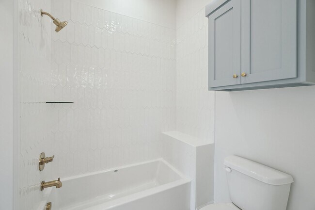 Building Photo - Classic Cape Cod Meets Modern Glam: Your D...
