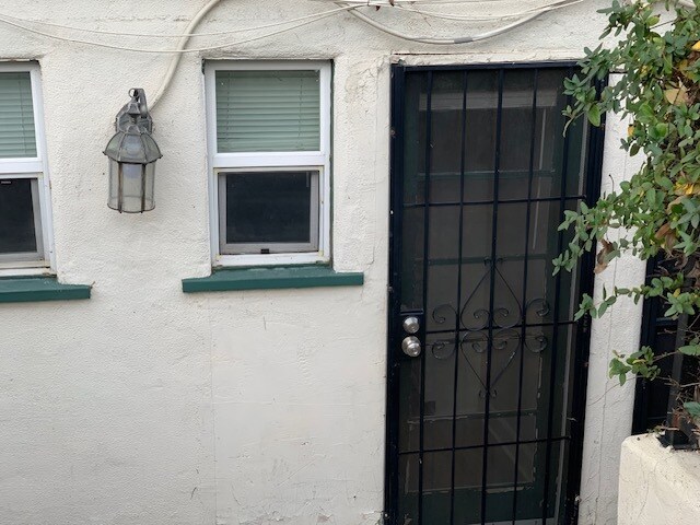 Entrance to the unit is in the back of the duplex. - 24606 University Ave
