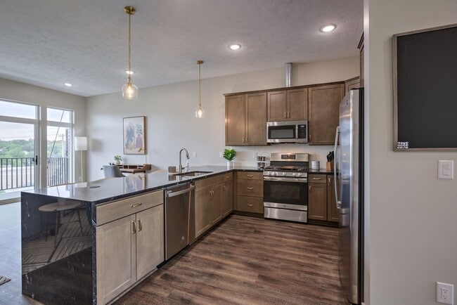 Building Photo - Modern 3BR Retreat | Penthouse + Skyline Views - Fully Furnished Option