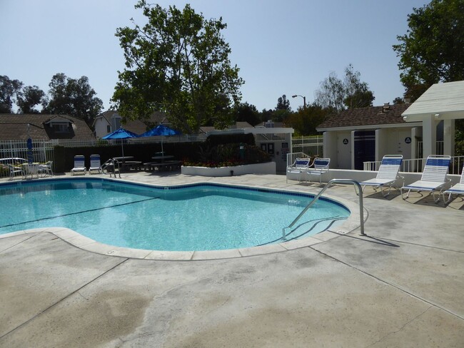 Building Photo - COMING SOON! Charming 2-Bedroom Home with a Versatile Loft in The Bungalows of Valencia!