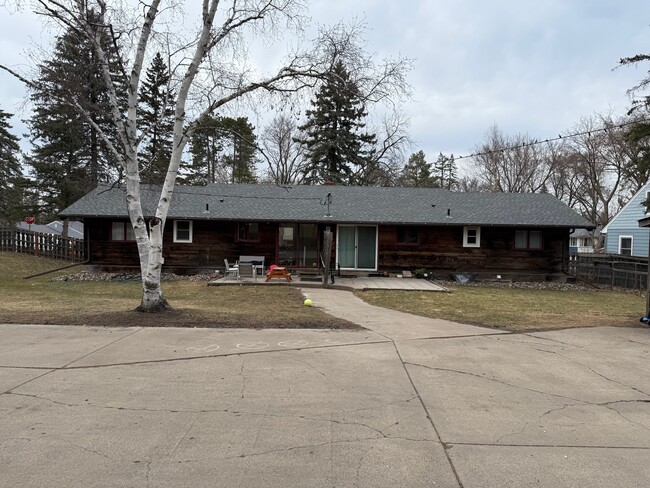 Large backyard with walkout patio area and LARGE driveway. 1120 is unit on the right. - 1120 Lealand Rd E