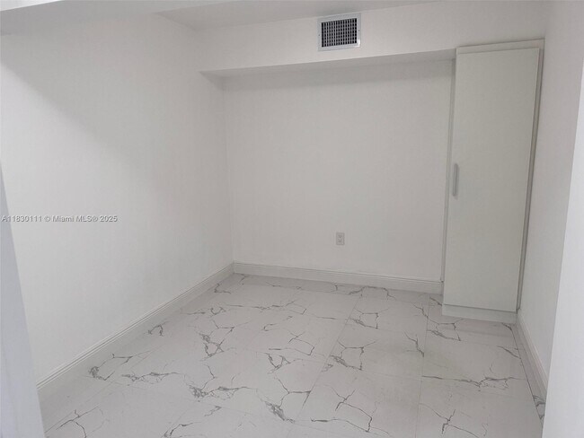 Building Photo - 6951 W 17th Ct