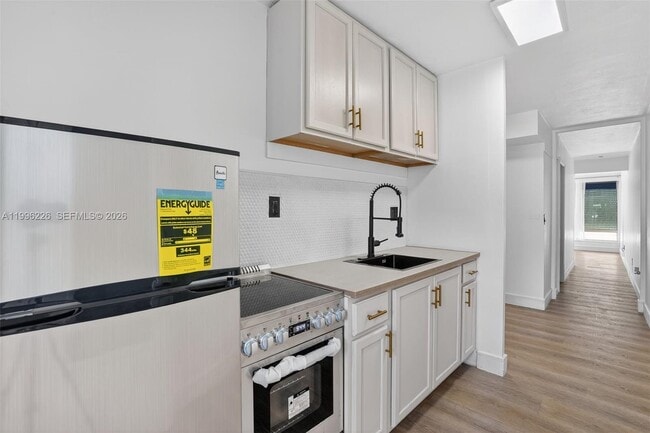 Building Photo - 10240 Collins Ave