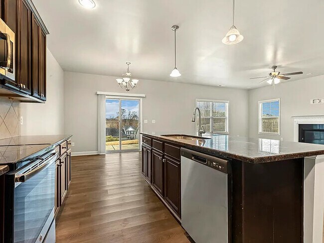 Building Photo - Earn Wealth While Leasing - Like a Homeown...