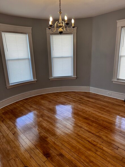 Bedroom 1 with chandelier - 16 Hillside St