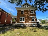 Building Photo - NORWOOD - Immaculate 1 bed efficiency unit on top floor of 4 family