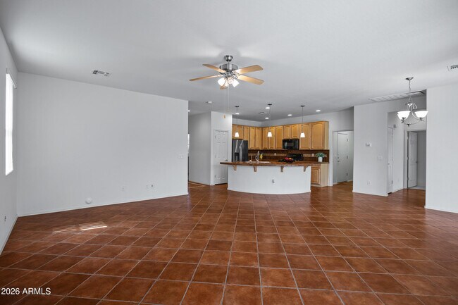 Building Photo - 42406 W Falling Star Dr