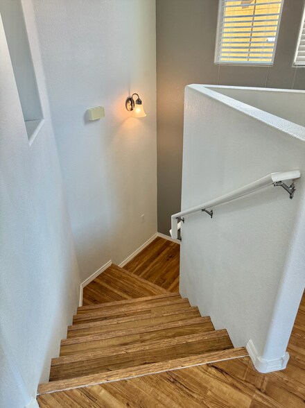 Stairs to Attached Garage - 601 Menaul Blvd NE