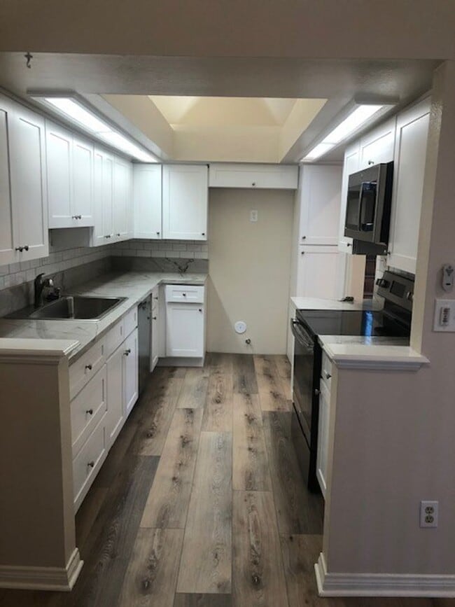 Primary Photo - Remodeled 2-Bed, 2-Bath Condo with Garage ...