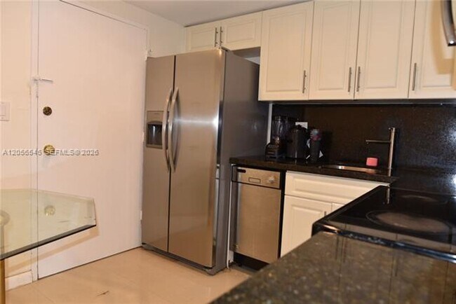 Building Photo - 5555 Collins Ave