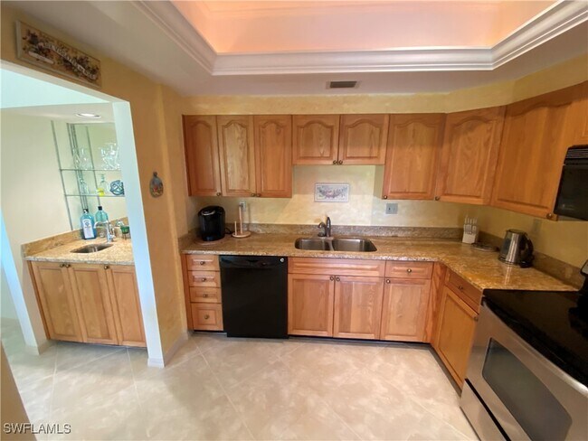 Building Photo - 6760 Pelican Bay Blvd