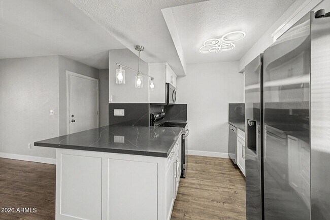 Building Photo - 4554 E Paradise Village Pky N