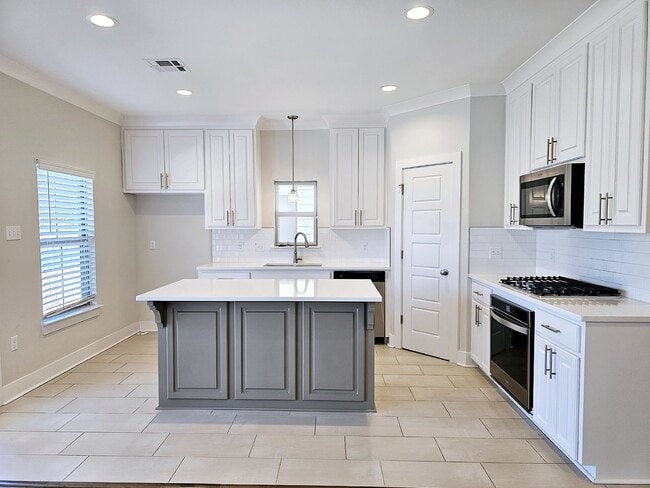 Building Photo - Stunning 4-Bedroom Waterfront Home with Granite Countertops and Hardwood Floors in The Sanctuary ...