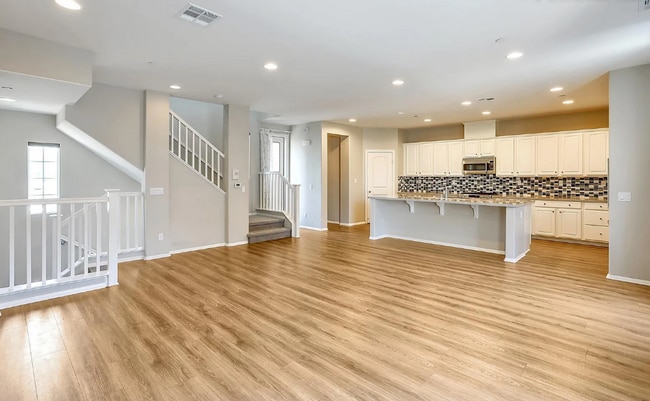 Building Photo - This gorgeous 3-bedroom, 3.5 bath townhome...