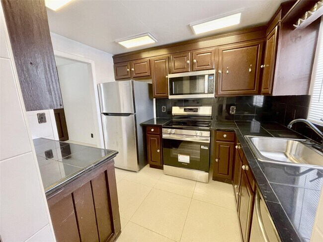 Building Photo - 5090 SW 64th Ave