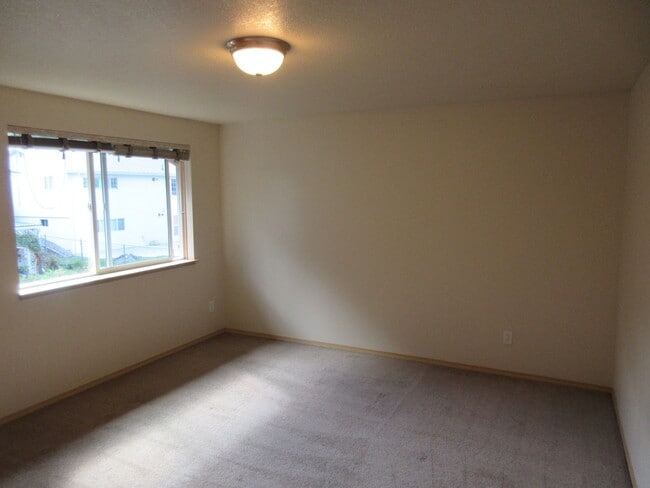 Building Photo - Large Three Bedroom Home, Landscaping Prov...