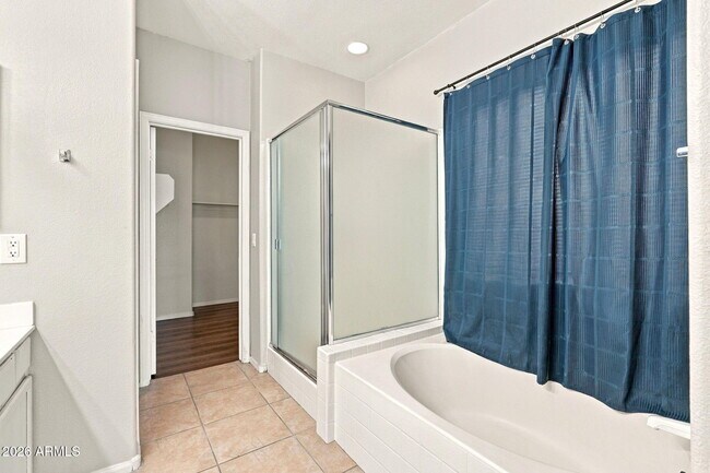 Building Photo - 8776 W Cherry Hills Dr