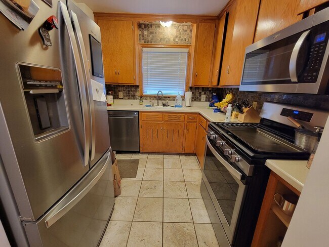 Building Photo - 3bd/2ba Mpls House with Optional 3rd Bd & ...