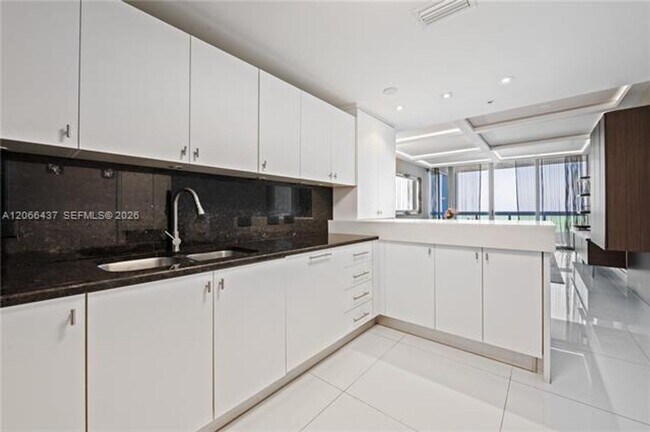 Building Photo - 6899 Collins Ave