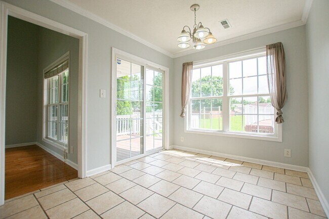 Building Photo - Three Bedroom with Bonus and Pool!