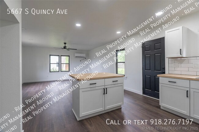 Building Photo - 5667 S Quincy Ave