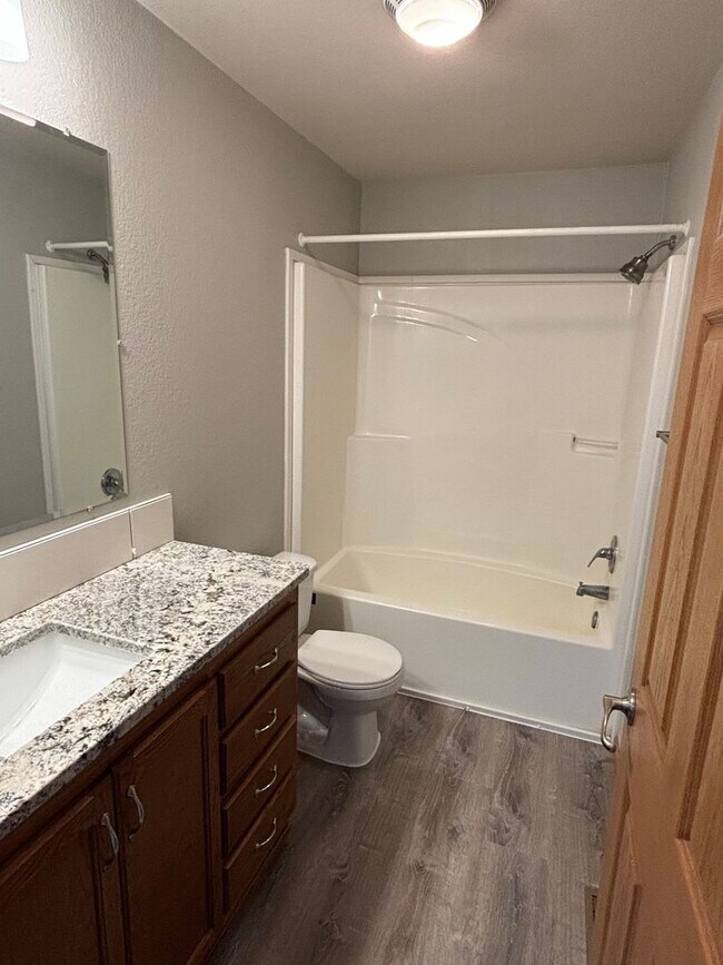 Building Photo - Fully Remodeled 3 Bedroom | 2.5 Bath Townhome – Great Location off K-18!