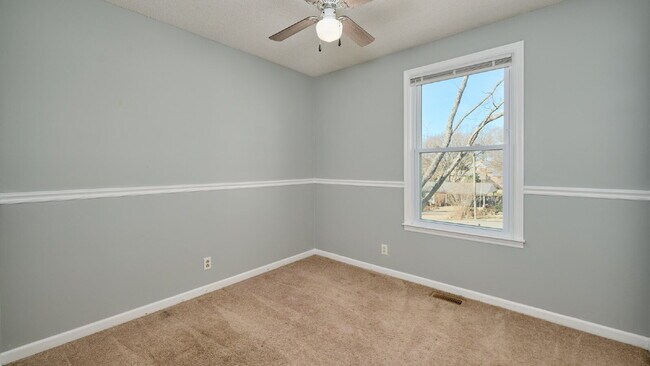 Building Photo - Now Ready : 4BR, 1 1/2BA home with fenced in back yard and storage building.