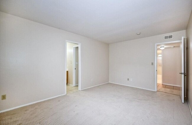 Building Photo - First-Floor 2BR Condo with Pool Access & Covered Parking in La Bonita