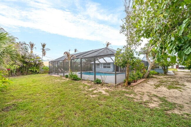 Building Photo - 4BR/2.5BA in gorgeous Melbourne Beach!