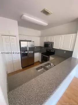 Building Photo - 5470 NW 107th Ave