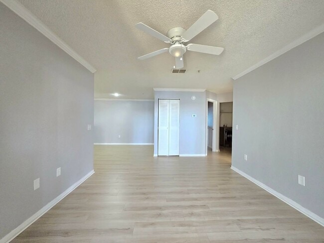 Building Photo - Beautiful 2BR/2BA Condo in Sunset Lakes – Lake & Tree Views!