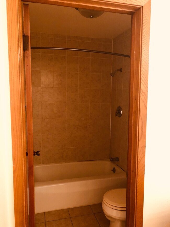 Building Photo - Spruce Court Apartment - Greenfield WI - Call 262-420-0390 to schedule a showing