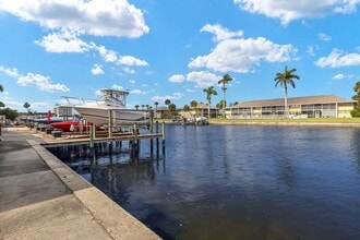Building Photo - Furnished Gulf Access Canal View Boat Lift...