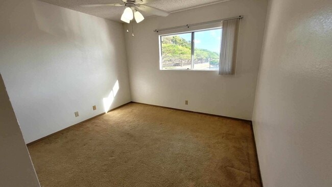 Building Photo - Mililani Parkway 2 Bedroom 1 Bath with 2 P...