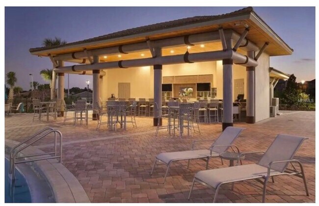 Building Photo - BEAUTIFUL CHAMPIONS GATE 2 BED 2 BATH COND0  w/GARAGE - FULLY FURNISHED - 12 MONTH RENTAL