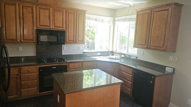 Building Photo - Four Bedroom Home Available!