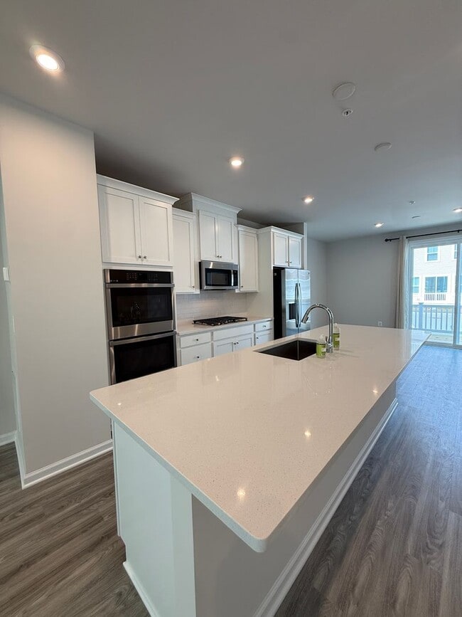 Building Photo - Luxury 3BR Townhome in Shipley Homestead | Quartz Kitchen, Fireplace & 2-Car Garage