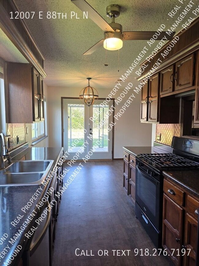 Building Photo - 12007 E 88th Pl N