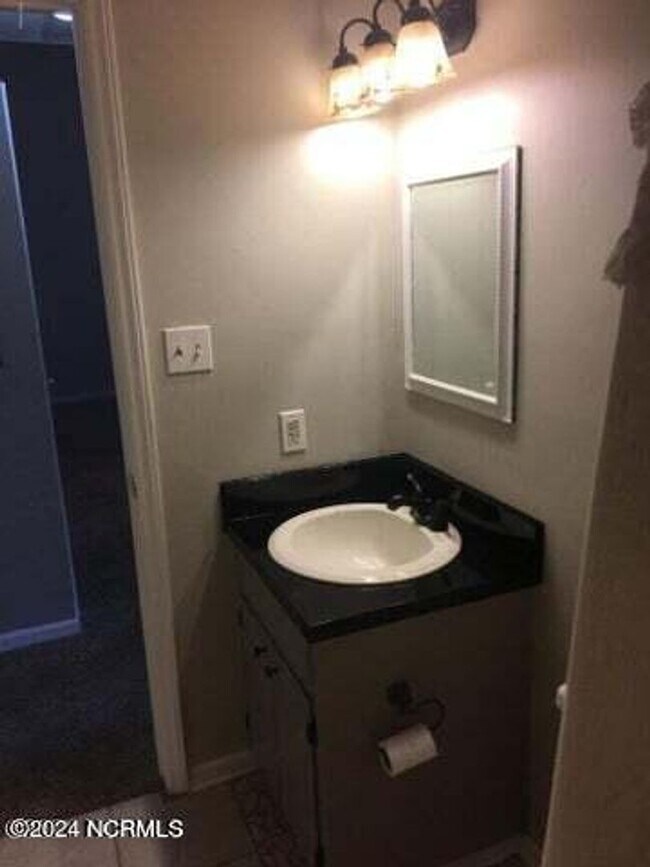 Building Photo - Welcome to Village Cedars!