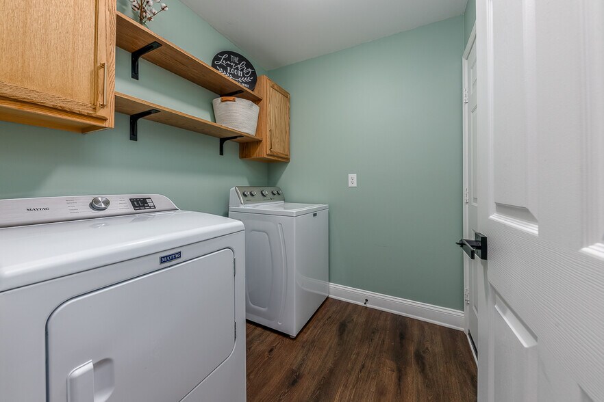 Laundry Room: Dedicated space for washing and drying clothes. - 122 Sellhorn Blvd