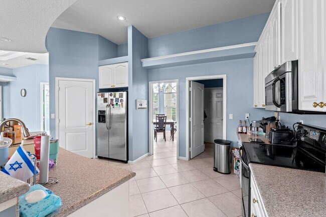 Building Photo - 103 Black Olive Crescent