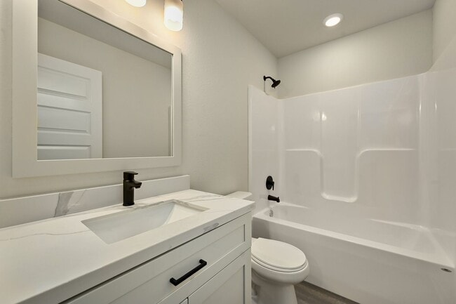 Building Photo - Three Bedroom Townhome with Large Unfinish...